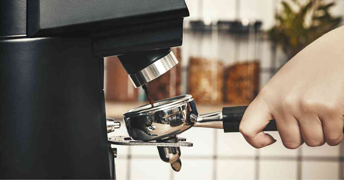 barista grinding coffee
